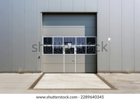 Truck door or loading dock of a warehouse. rolling gate for delivery vehicles. 