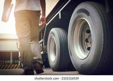 Truck Driver is Checking the Truck's Safety Maintenance Checklist. Inspection Truck Safety. Semi Truck Wheels and Tires.	
 - Powered by Shutterstock