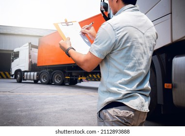 Truck Driver Is Checking The Truck's Safety Maintenance Checklist. Lorry. Inspection Semi Truck Wheels And Tires. Warehouse Cargo Shipping. Loading Freight Truck Transport  Logistics.	
