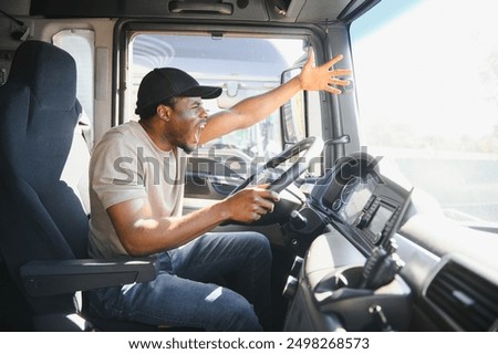 Truck driver gets angry while driving.