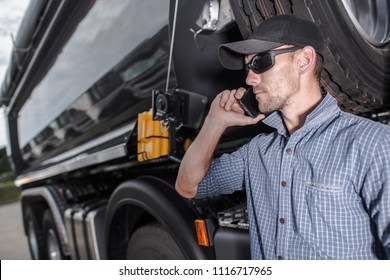 Truck Driver Making Business. Dealing With Potential Clients On The Phone. Heavy Transportation Industry.