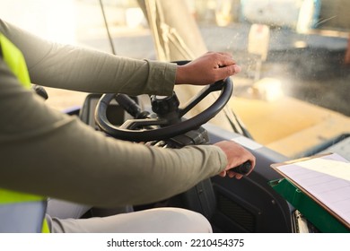 Truck driver man, steering wheel and delivery van cargo, shipping logistics and trade industry supply chain. Hands driving forklift, transport or commercial distribution for industrial construction