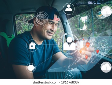 Truck Driver Man Using Modern High Tech Technology Digital. Worker Deliver Men Communication With People Online. Young Asian Men Connection Network And Find Their Location On The World Map Screen.