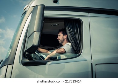 Truck Driver Sitting In Cab