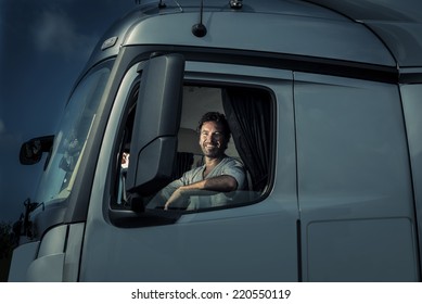 Truck Driver Sitting In Cab