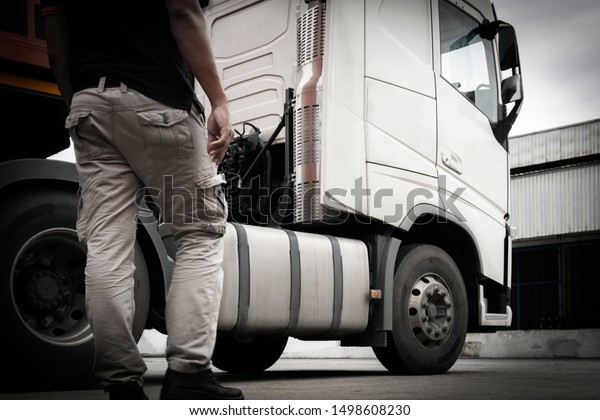 truck driver with white semi\
truck
