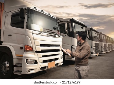 Truck Drivers Checking The Semi Truck's Maintenance Checklist. Inspection Safety Before Driving. Freight Truck Transport.