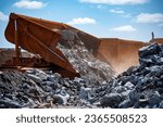 Truck Dumping Ore from Mine