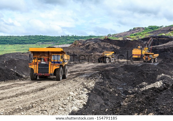 Truck and Electric Shovel\
in Open Pit