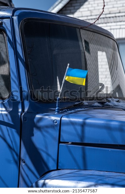Truck flag\
ukraine. Volunteers. Help for\
refugees