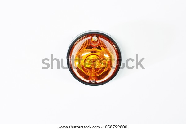 truck\
front turn signal lamp with a yellow plastic glass\
