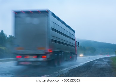 Truck Going On The Wet Country Highway To Rain