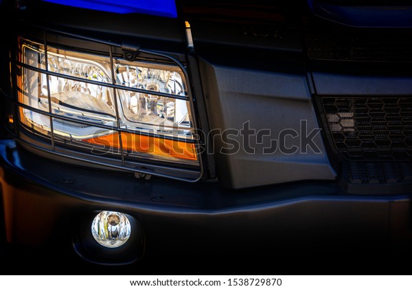 truck headlight on the road\
at night. Concept. Glamorous night look. Background for\
advertising.