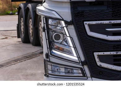 Truck Headlights Illuminated And Gridded