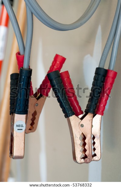 Truck Jumper Cables Hanging Against Drywall Stock Photo Edit Now