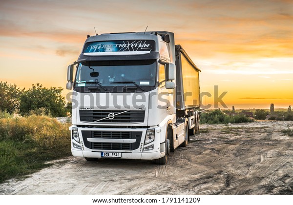 Truck\
in Kolin, Czech Republic with sunset, August\
2020