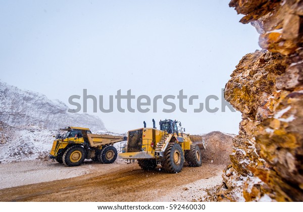 Truck loading. Gold\
mining