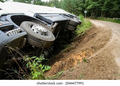 The Truck Is Lying On Its Side In A Car Accident