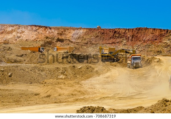 Truck many works in the\
quarry mining