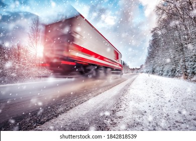 Truck On Asphalt Road In Winter On Sunny Morning