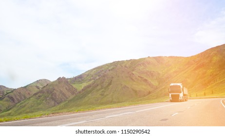 Truck on the mountain road - Shutterstock ID 1150290542
