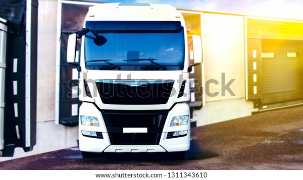 Truck on the road . Commercial transport . \
truck transport container