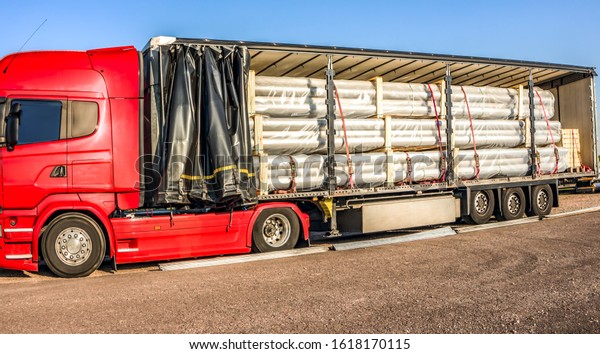 Truck on road . Truck - Freight transportation .\
delivery of cargo