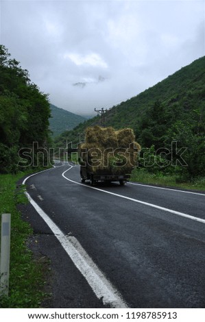 truck on road with mountain