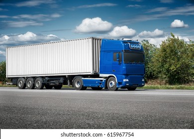Truck on road with white blank container, shipping, delivery and cargo transportation concept