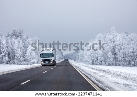 Truck on winter country road