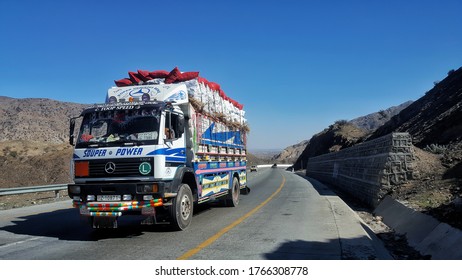 A truck passing by Khyber pass landi kotal jamrud Peshawar to torkham road. Pakistan 22 February 2019