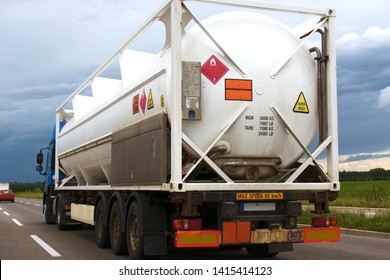 Truck With A Portable Fuel Tank On It Racing Against The Storm On A Highway