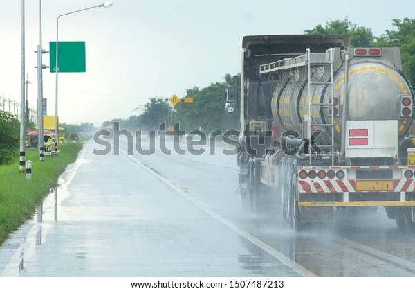     truck  with rain drops driving in\
rain.Traffic background                          \
