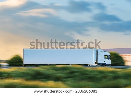 Similar – Foto Bild Lastwagen mit Kühlsattelauflieger auf einem Viadukt über einen Sumpf, Landschaft.