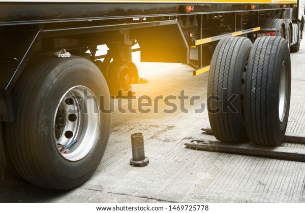 truck repairing and maintenance. truck spare\
wheels tire waiting for to\
change.
