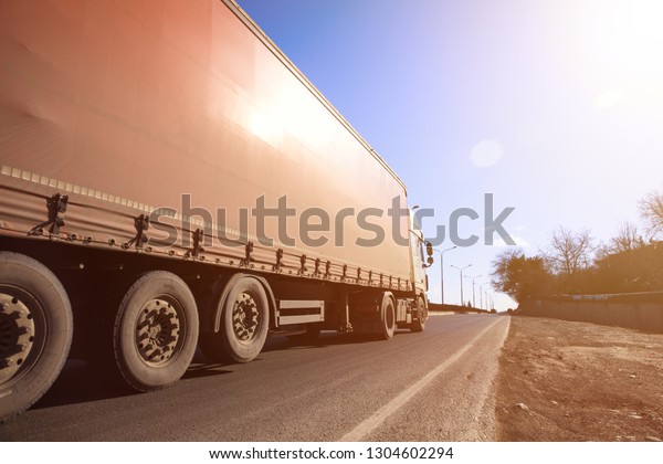 truck in road at\
sunset\
