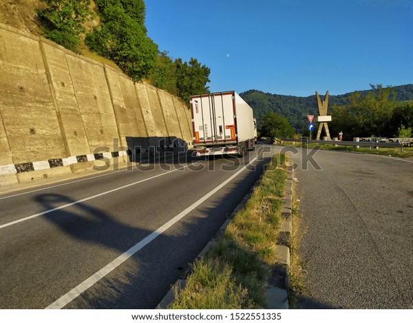 \
truck from Schmitz Cargobull, truck on the road,\
truck that transports the goods  , German company, truck with\
container, cargo transportation concept,  Semi trailer, Brasov,\
Romania, August 31,\
2019