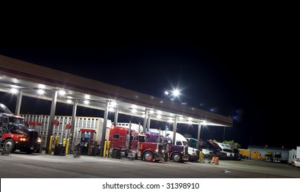 Truck Stop At Night Getting Diesel