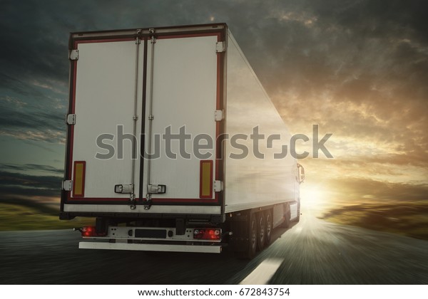 Truck at sunset on a country\
road