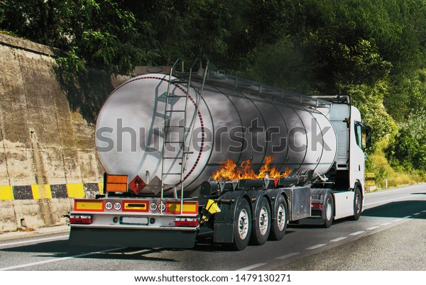 Truck tank in fire. Fire\
broke out at a tanker carrying diesel. Danger of explosion. Dangers\
that may occur to cars carrying fuel. Fuell. Resita, Romania.\
July,03, 2019. 
