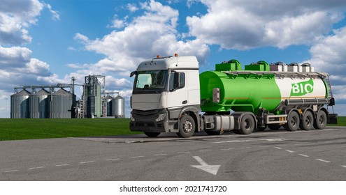 Truck With A Tank With The Inscription BIO On The Background Of Silos. Biofuel Concept.