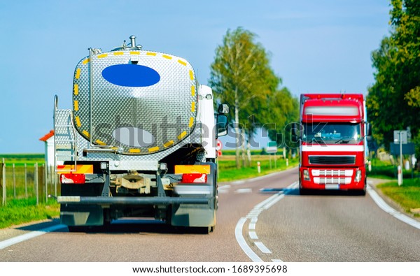 Truck tanker on the road in Poland. Lorry
transport delivering some freight
cargo.