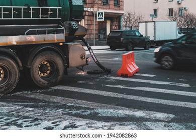 Truck Tanker Pumps Out Water Flood Accident City Street Clean .Russia,Saint-Petersburg, 18mar2021.