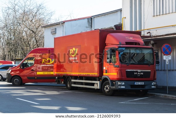 The\
truck that carries parcels and letters. Romanian Post car parked to\
unload cargo. Romania, Severin, February, 19,\
2022