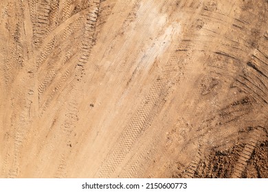 Truck Tire Tracks On Dirt Ground. Overhead View