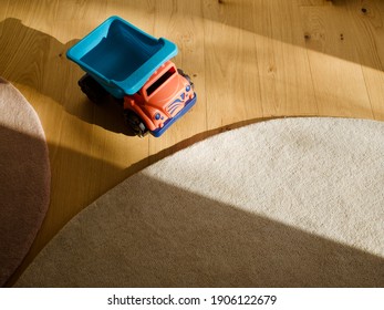 A Truck Toy On The Floor.