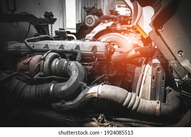 Truck Tractor Engine Opening For Maintenance Servicing. Diesel Truck Engine. Auto Service Shop