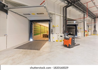 Truck Trailer At Loading Bay Pallet Jack Warehouse