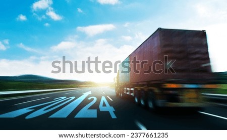 Truck transportation running on high road with new year number 2024