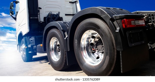 Truck transportation, semi truck close up truck tire.